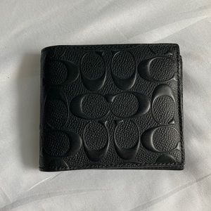Black leather coach wallet